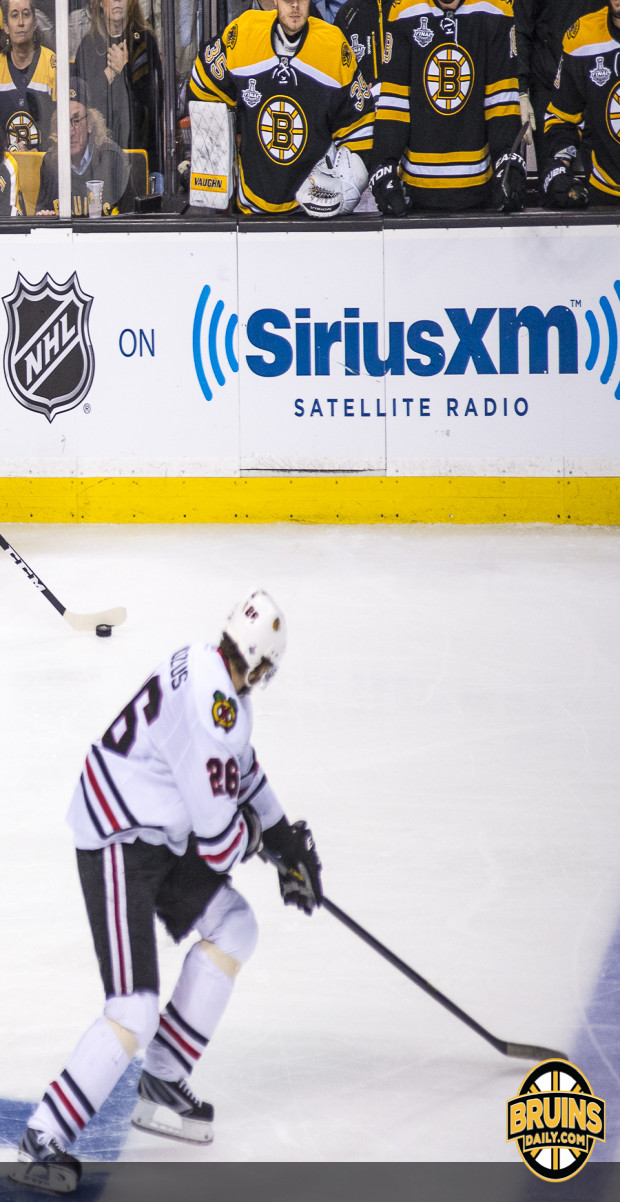 Blackhawks regain momentum in OT win over Bruins