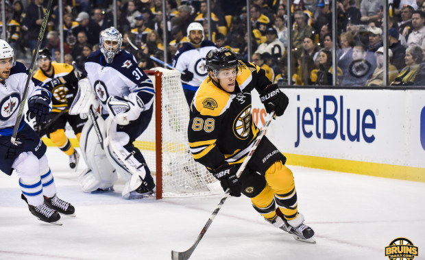 Missed opportunities doom Bruins in season opener