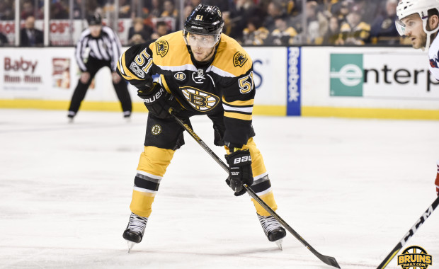 Spooner, Bruins, agree to settle