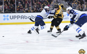 Bruins withstand Jets rally